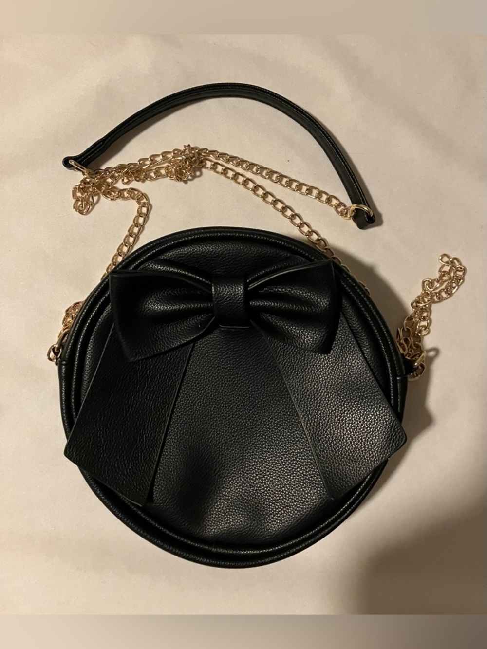 Black Round Crossbody Bag with Bow and Gold Chain